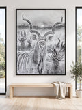 Grey Ghost in a black floating frame, shown in a modern white room