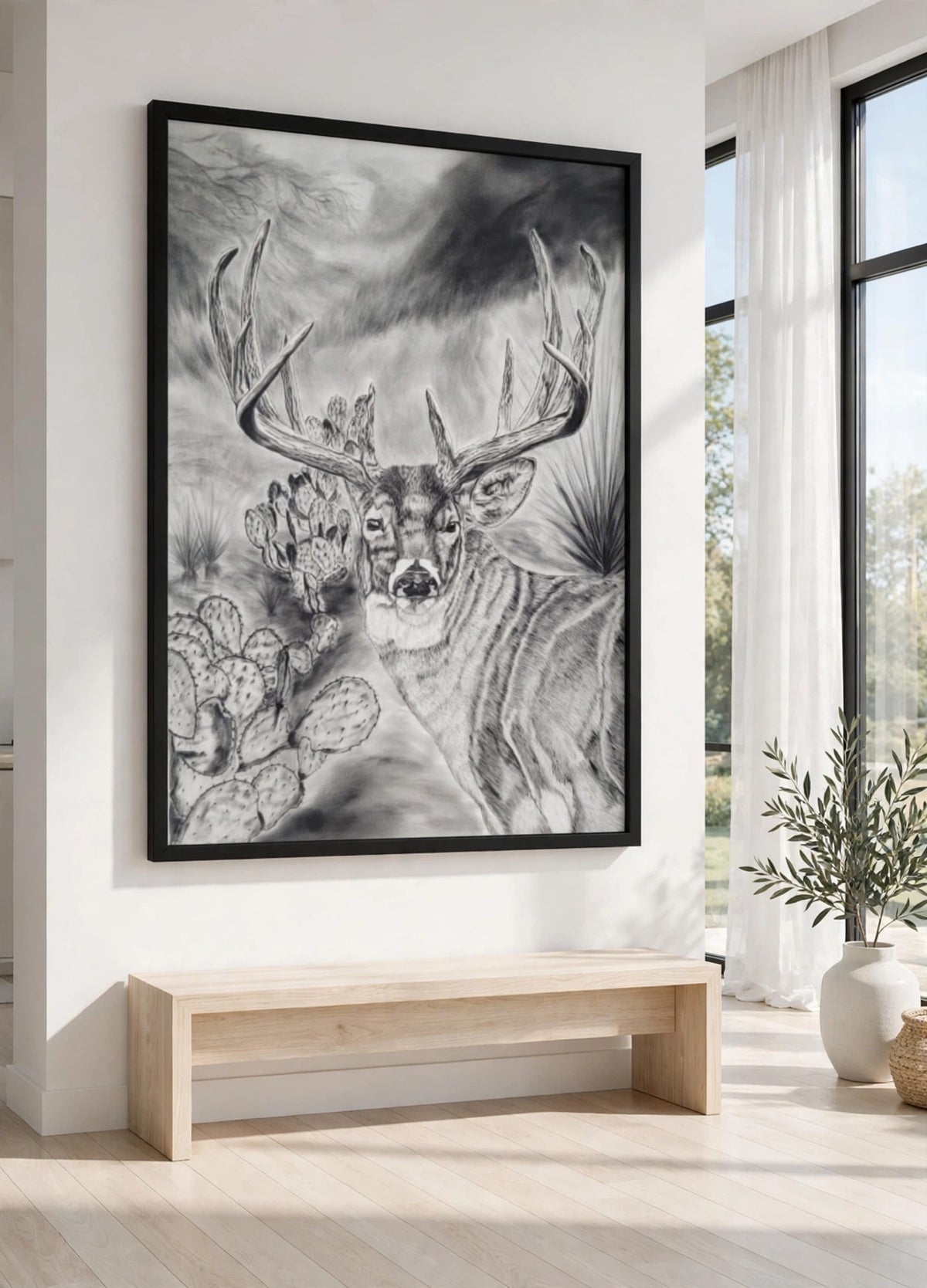 The Legacy in a black floating frame, shown in a modern white room